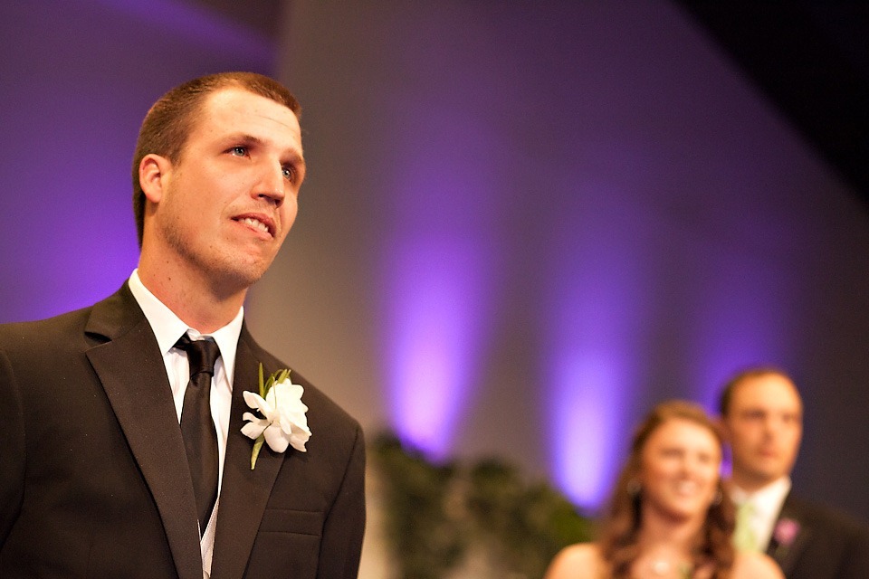 Groom crying during wedding