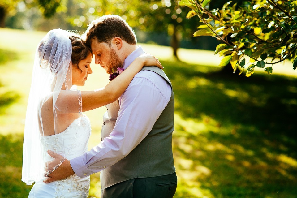 Bride and groom at the Ephrata Cloister at sunset