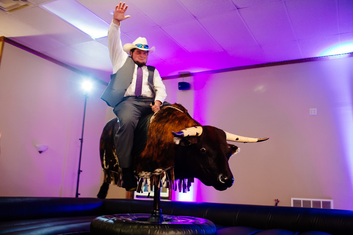 mechanical bull wedding photography